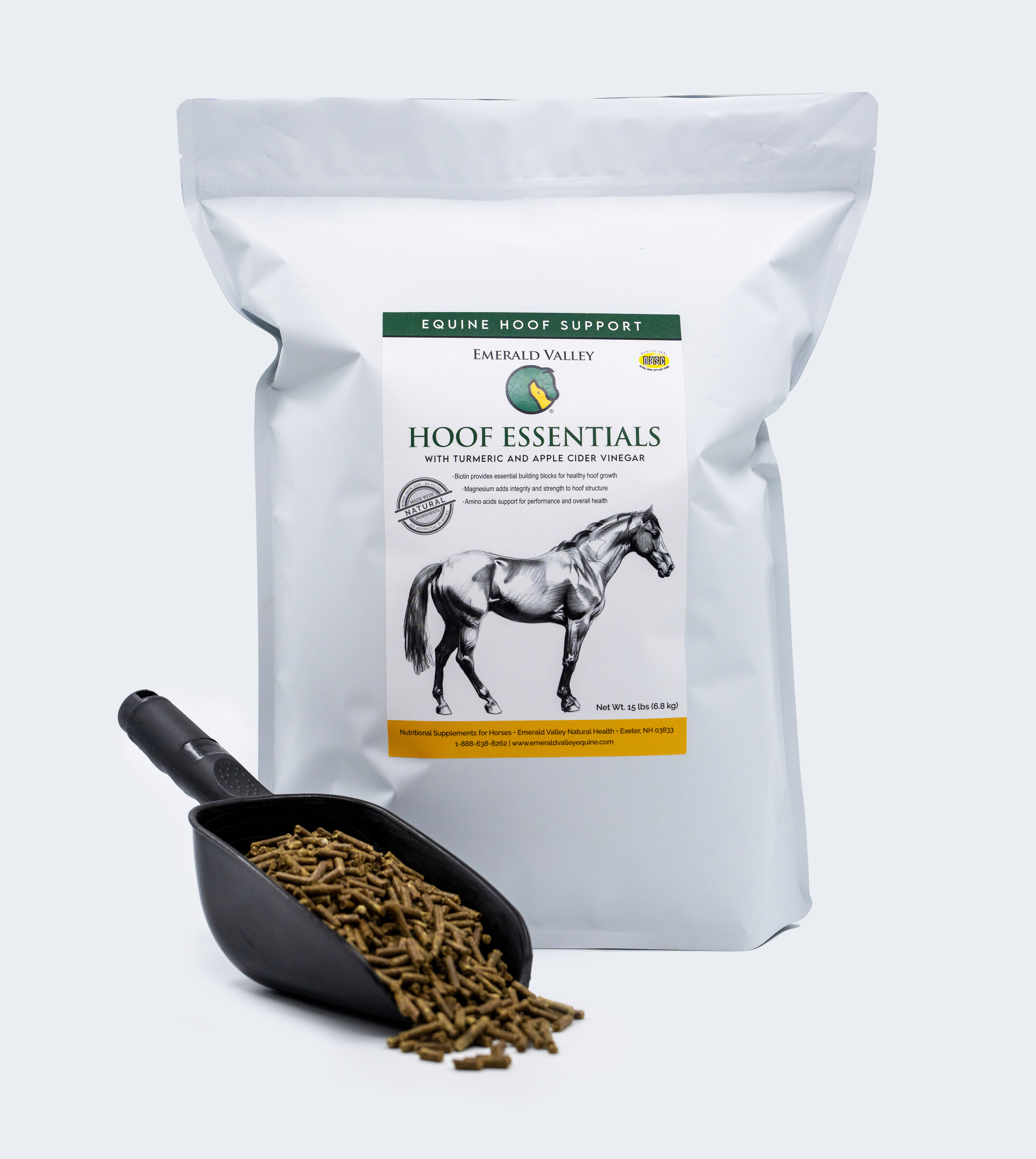 The Hoof Essentials product bag for Emerald Valley Natural Health, beside a black scoop of pelleted feed.
